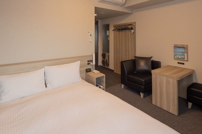 Desk, laptop workspace, blackout drapes, iron/ironing board