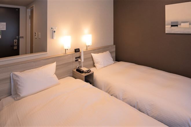 Desk, laptop workspace, blackout drapes, iron/ironing board