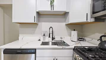 Coffee/tea maker, fridge, microwave, oven