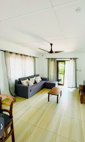 Deluxe Apartment, 1 Bedroom, Sea View | Living area | Smart TV