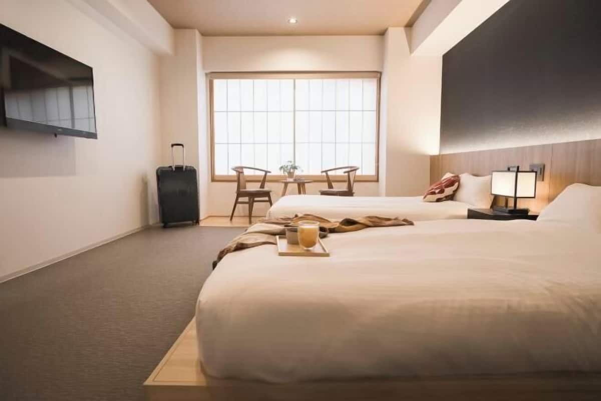 Desk, laptop workspace, blackout curtains, free WiFi
