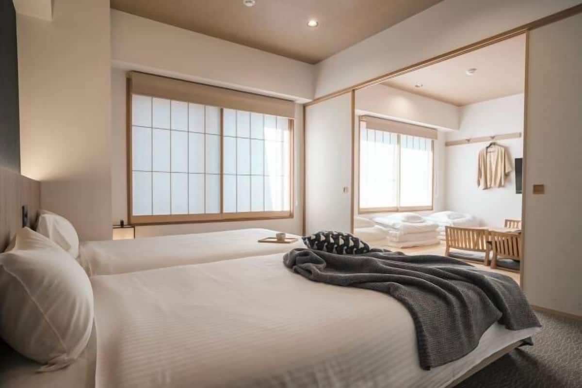 Desk, laptop workspace, blackout curtains, free WiFi