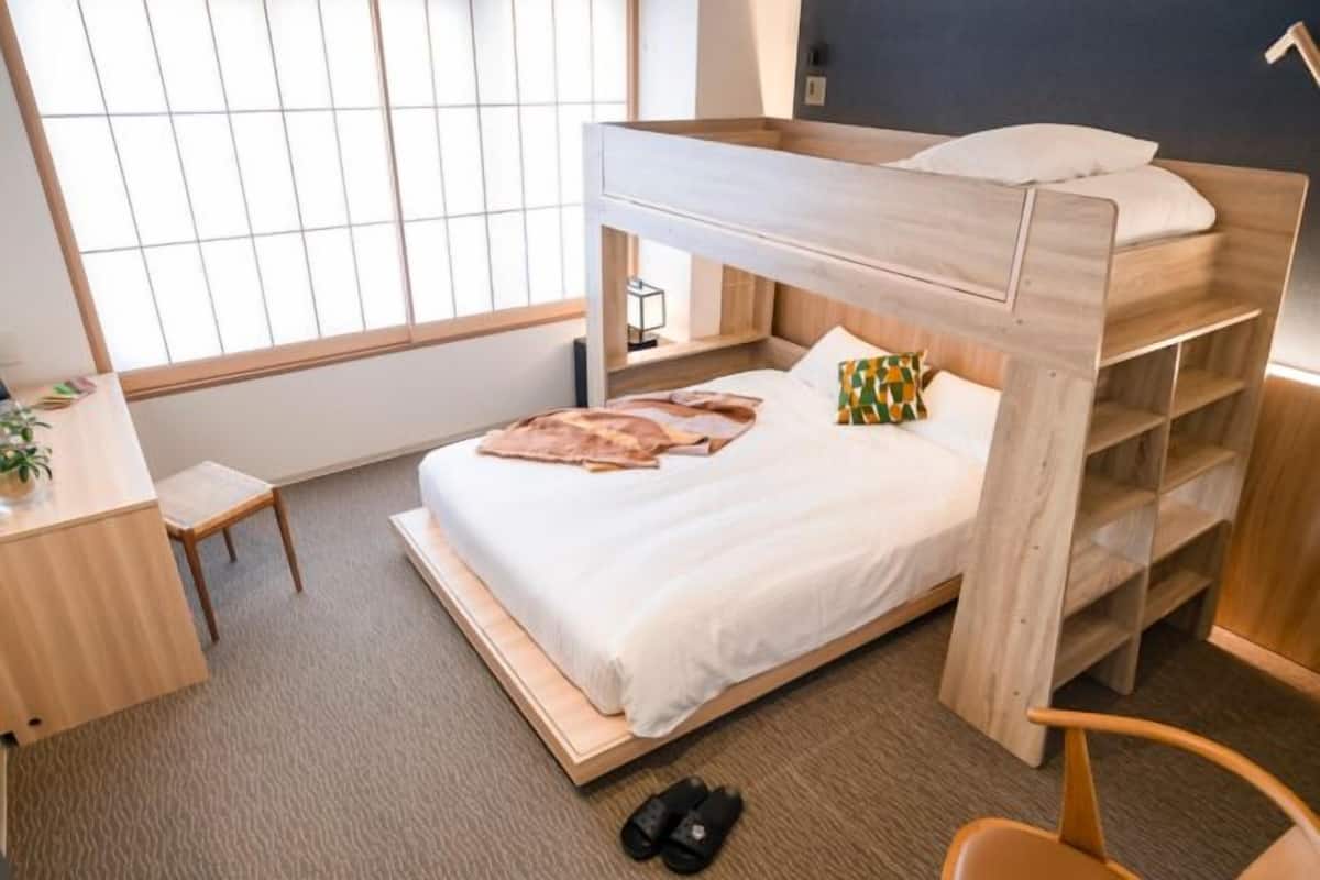 Desk, laptop workspace, blackout curtains, free WiFi