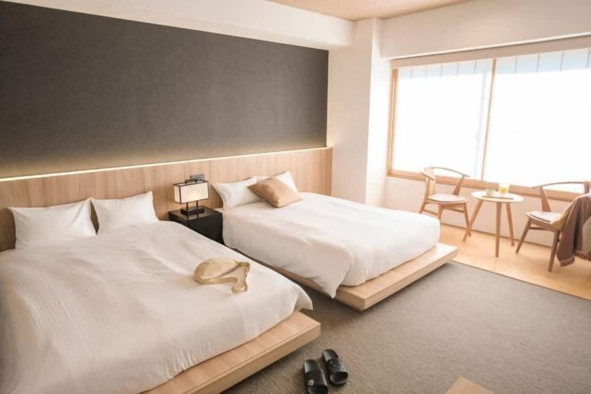 Desk, laptop workspace, blackout curtains, free WiFi