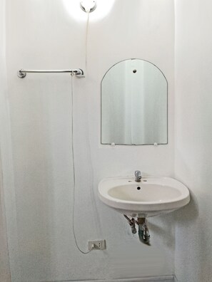 Dutxa, tovalloles, sabó i xampú 