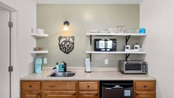 Microwave, coffee/tea maker, toaster, cookware/dishes/utensils