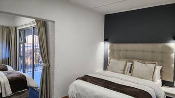 1 dormitorio, tabla de planchar con plancha, Internet y ropa de cama