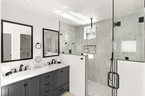 Shower, hair dryer, towels