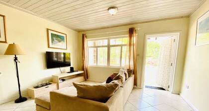 2-bedroom Gated Oasis with parking and
Pool