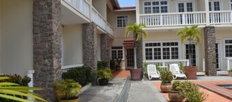  2-bedroom Gated Oasis with parking and
Pool