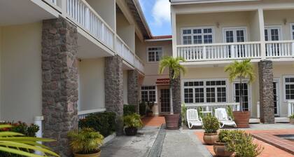 2-bedroom Gated Oasis with parking and
Pool