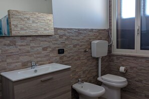 Hair dryer, towels, toilet paper