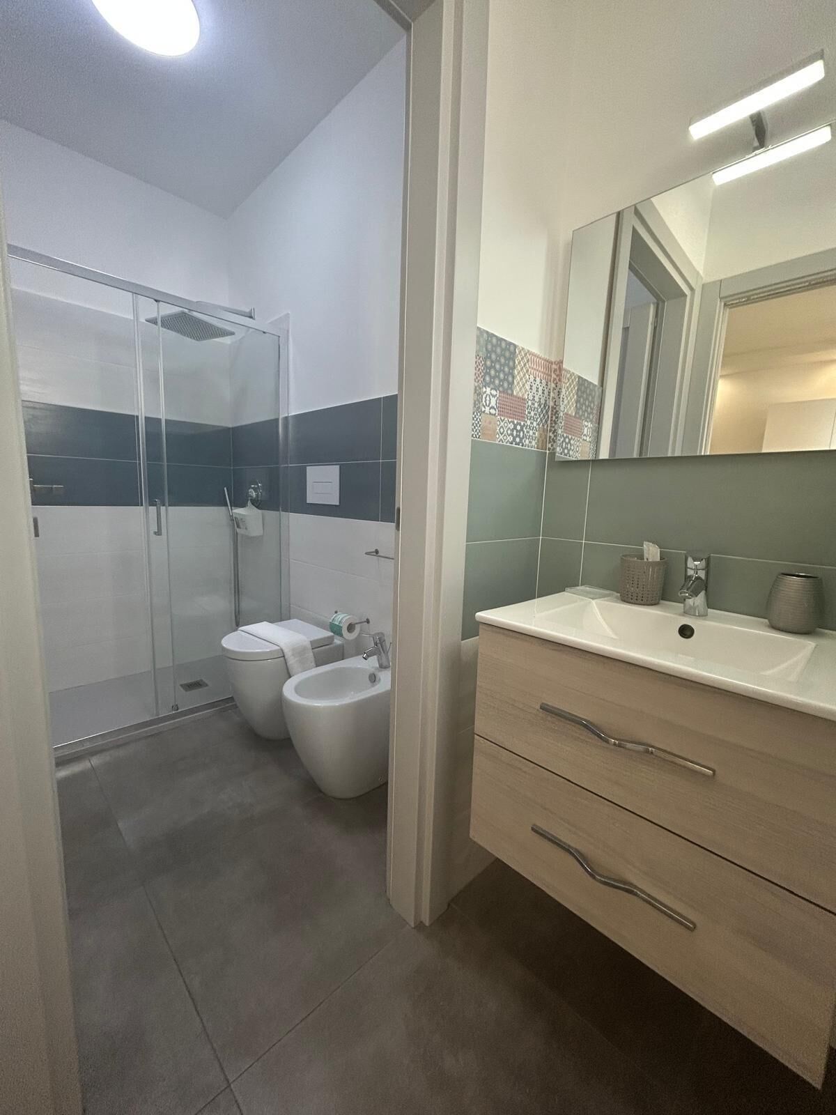 Salina | Bathroom | Shower, free toiletries, hair dryer, slippers