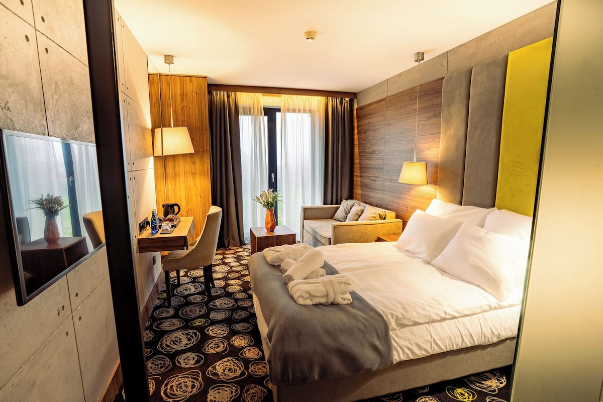 Economy Triple Room | In-room safe, desk, laptop workspace, blackout drapes