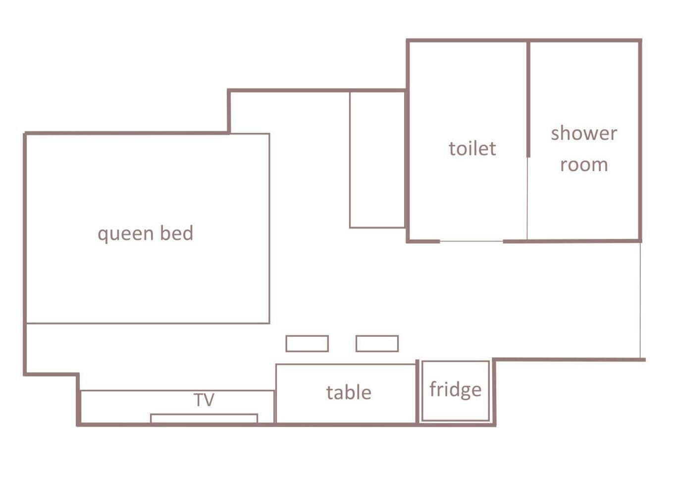 A room layout with a queen bed, TV, table, fridge, toilet, and shower room.