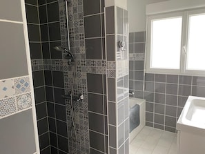 Shower, towels, toilet paper