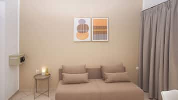 Apartamento superior, vistas al mar | Zona de estar | Juguetes