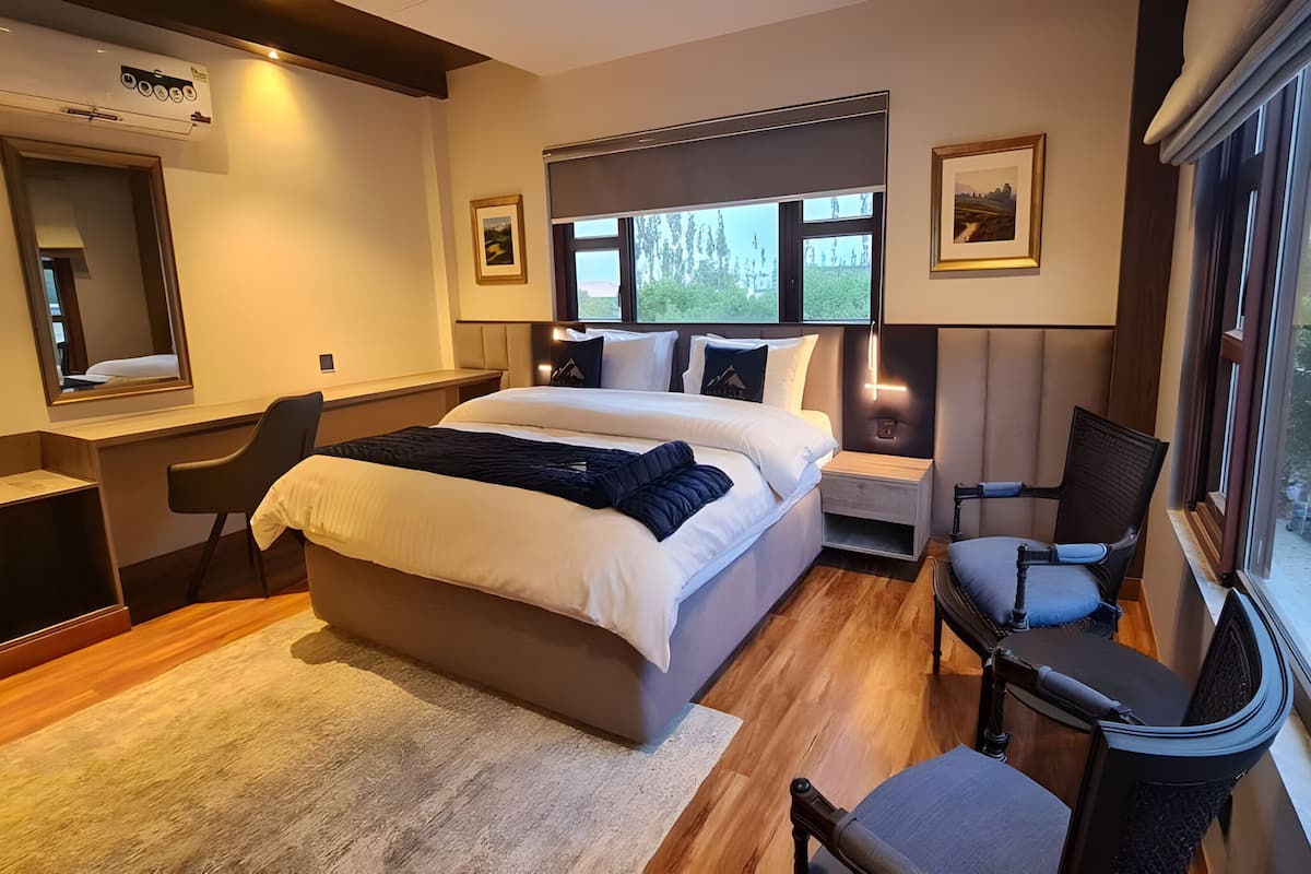 1 bedroom, desk, laptop workspace, iron/ironing board