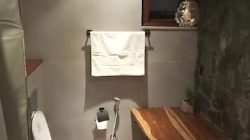 Shower, slippers, towels, soap