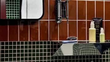 Shower, eco-friendly toiletries, hair dryer, towels