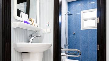 Separate bathtub and shower, hair dryer, bidet, towels