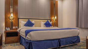 Caja fuerte y tabla de planchar con plancha