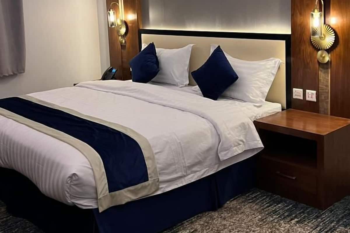 Economy kamer | 1 slaapkamer, een kluis op de kamer, een strijkplank/strijkijzer
