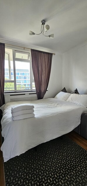 Departamento | 3 habitaciones, tabla de planchar con plancha y wifi gratis 
