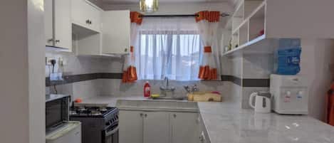 Apartment, 1 Bedroom | Private kitchen | Cookware/dishes/utensils