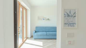 Comfort Apartment, Balcony, Mountain View | Living area | Flat-screen TV