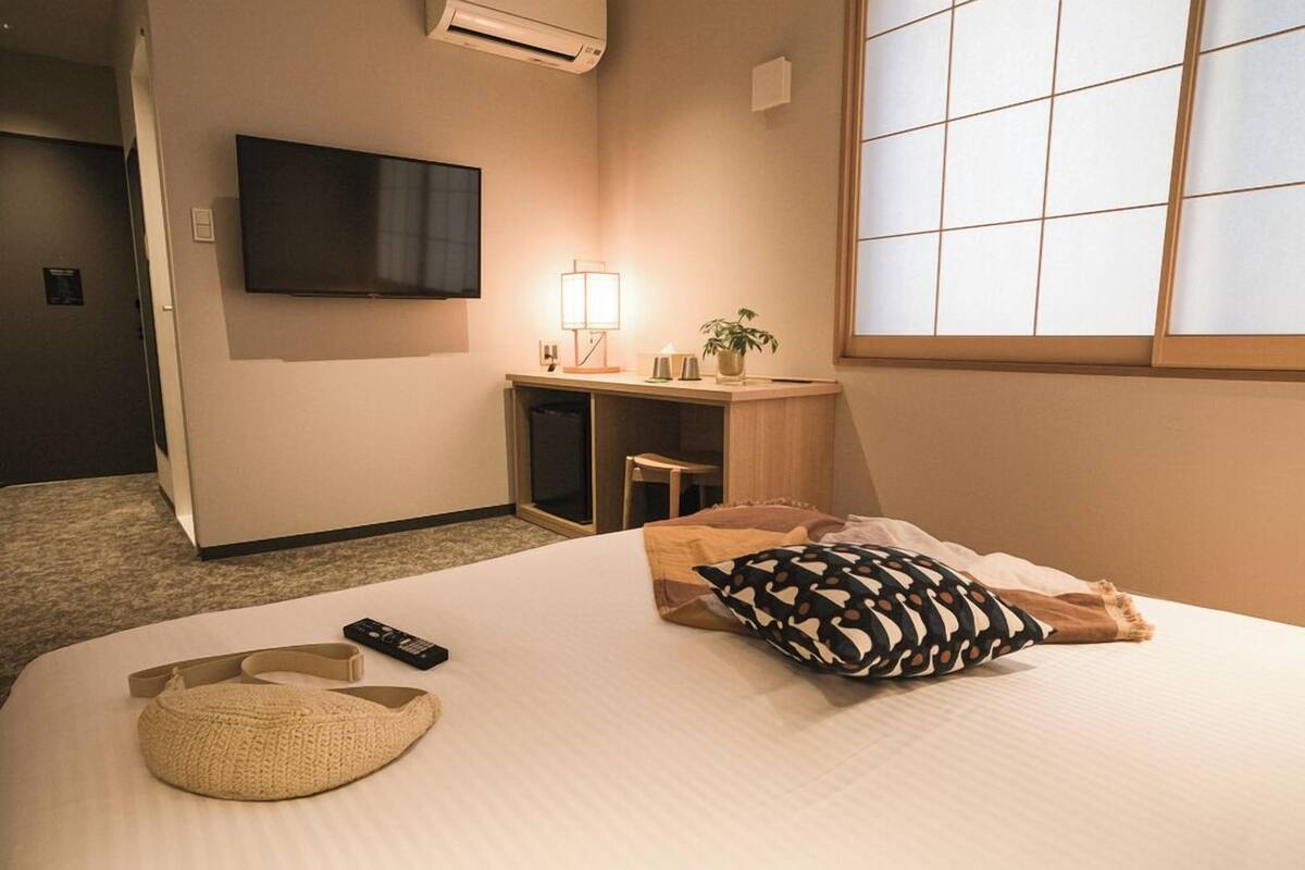 Desk, blackout curtains, free WiFi, bed sheets