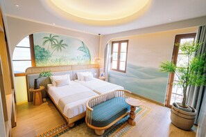 A hotel room with a bed, a bench, a potted plant, and a mural of palm trees. - Lotus Home Corner & Rooftop (Phu Quoc)