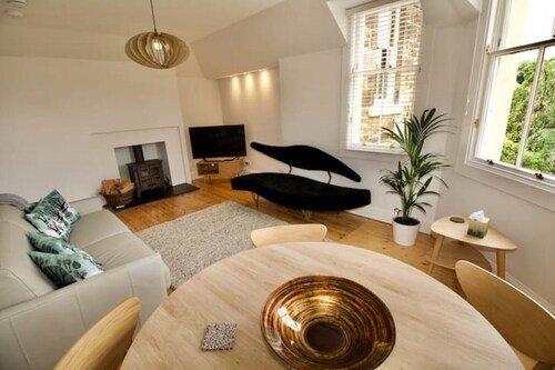 Charming coach house by the sea.