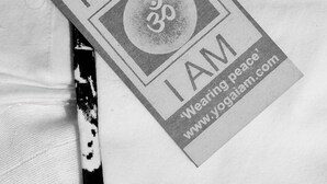 A yoga tag with the text "YOGA I AM" and a website address. - wellness studio Nottingham city centre (Nottingham)