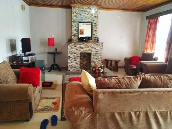 Family Villa, Balcony, Garden View | Living area