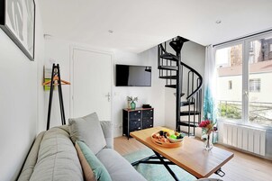 Apartamento City | Zona de estar