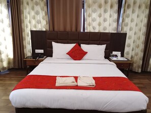 Chambre Double Deluxe | Draps en coton égyptien, literie de qualité supérieure