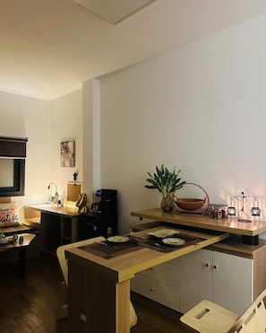 Deluxe-Studiosuite | Wohnbereich | Fernseher