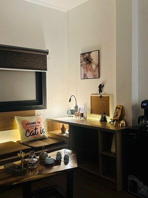 Suite estudio Deluxe | Área de sala de estar