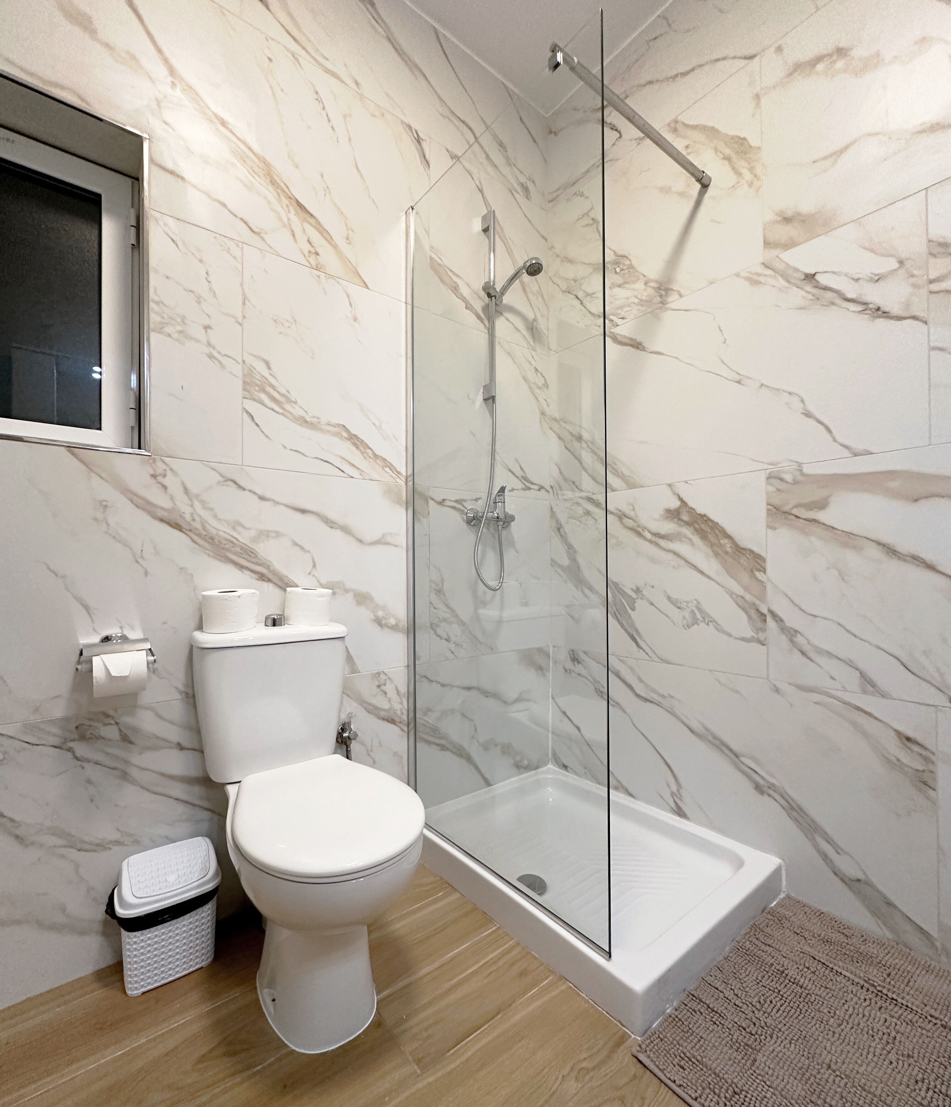 Studio Apartment | Bathroom | Shower, hair dryer, towels, soap