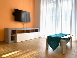 One Bedroom Apartment | Living area | 32-inch flat-screen TV with digital channels - Miami Apartments (St. Julian's)