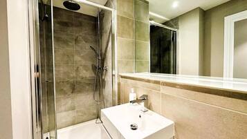 Hair dryer, towels, soap, shampoo