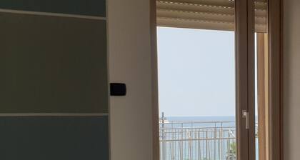 Comfortable one-bedroom apartment with kitchen and level terrace 50 meters from the sea