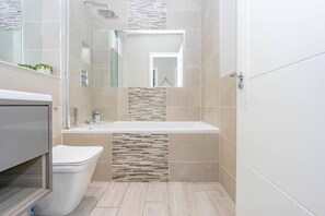 Hair dryer, towels, soap, shampoo