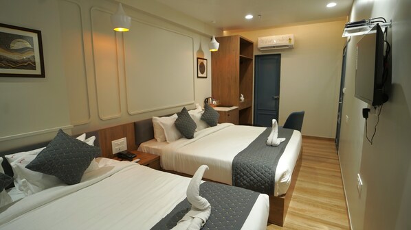 家庭客房 | 埃及棉床單、高級寢具、記憶床墊、書桌