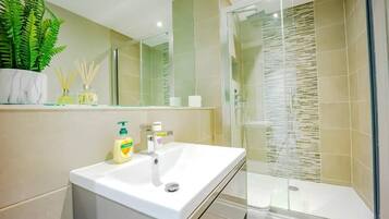 Hair dryer, towels, soap, shampoo