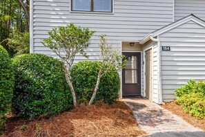 A house with a dark front door, a mailbox, and a number '184' on the side. - 2Br/2.5Ba, 2 Pools, Tennis, Beach Access! + Free Attraction Tickets! (Santa Rosa Beach)