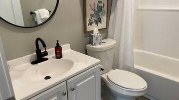 Hair dryer, towels, soap, shampoo