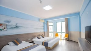A hotel room with two beds, a TV, a painting on the wall, and a window with curtains. - Lianyungang Liandao Yanyangtian Holiday Center (Lianyungang)