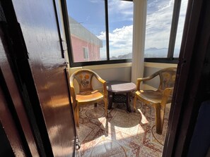 Dobbelt- eller tomannsrom, balkong, byutsikt | Terrasse/patio